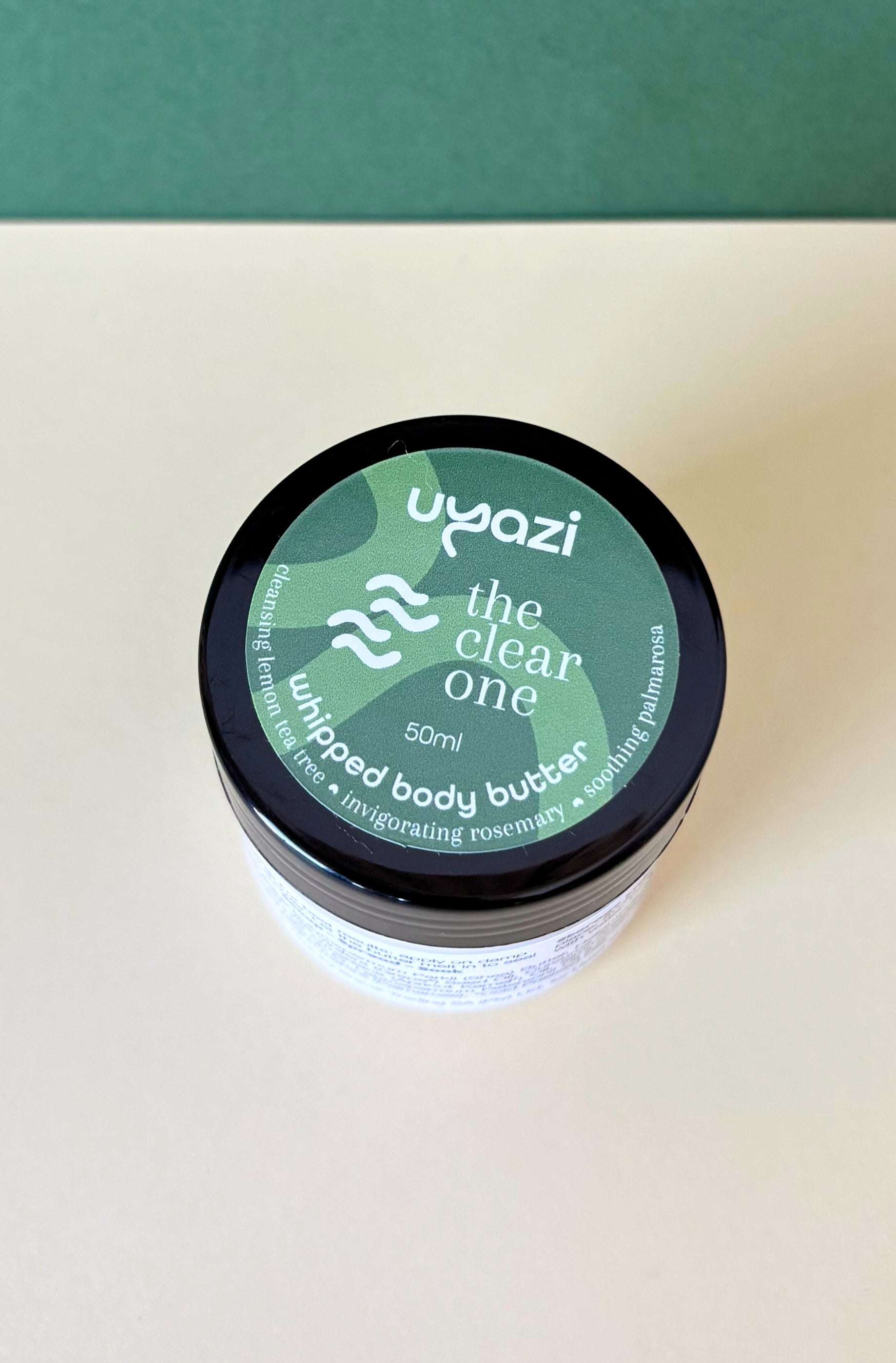Uyazi whipped body butter container on a light background