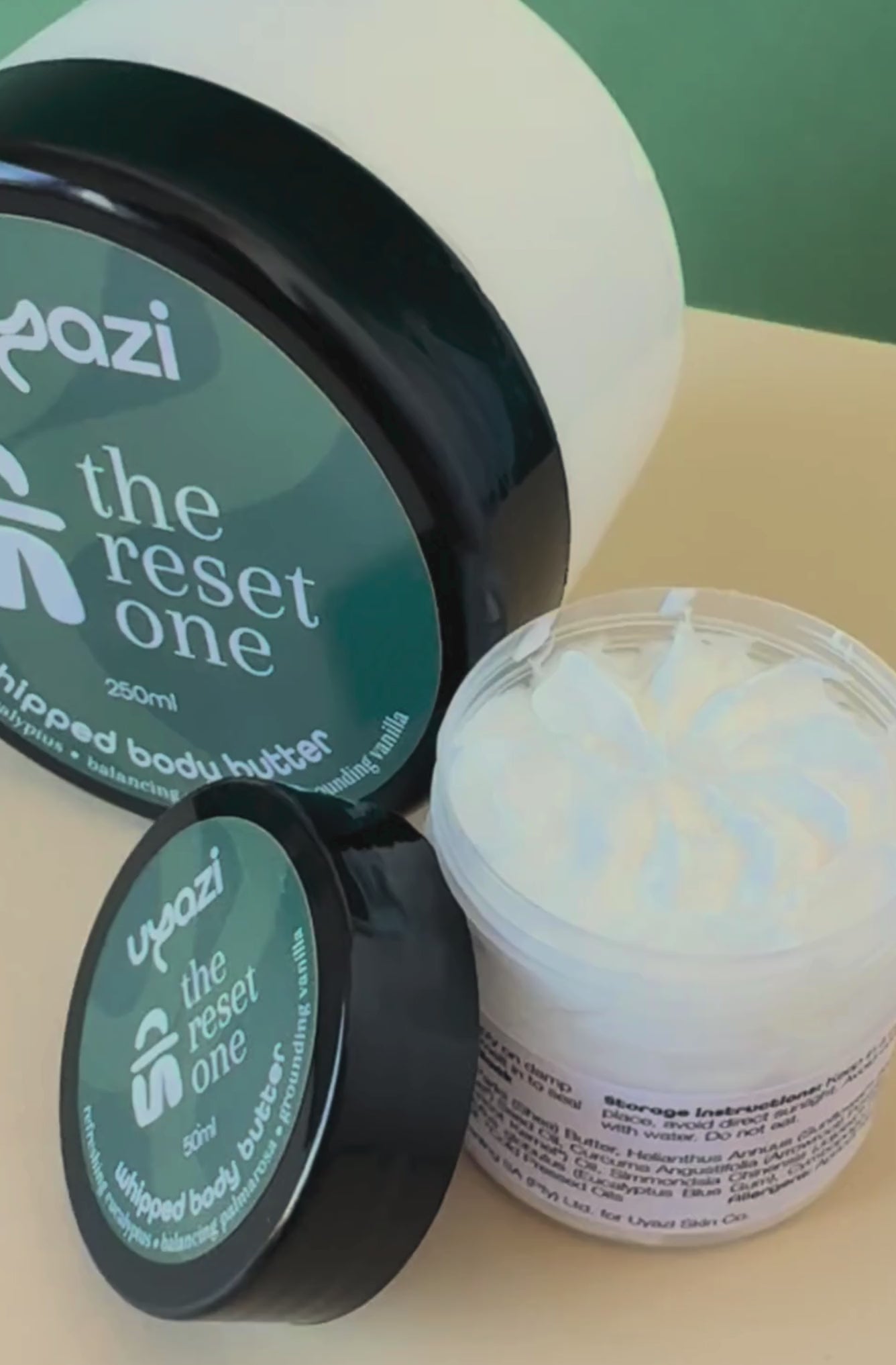 Close up video of whipped body butter in 50ml and 250ml jars