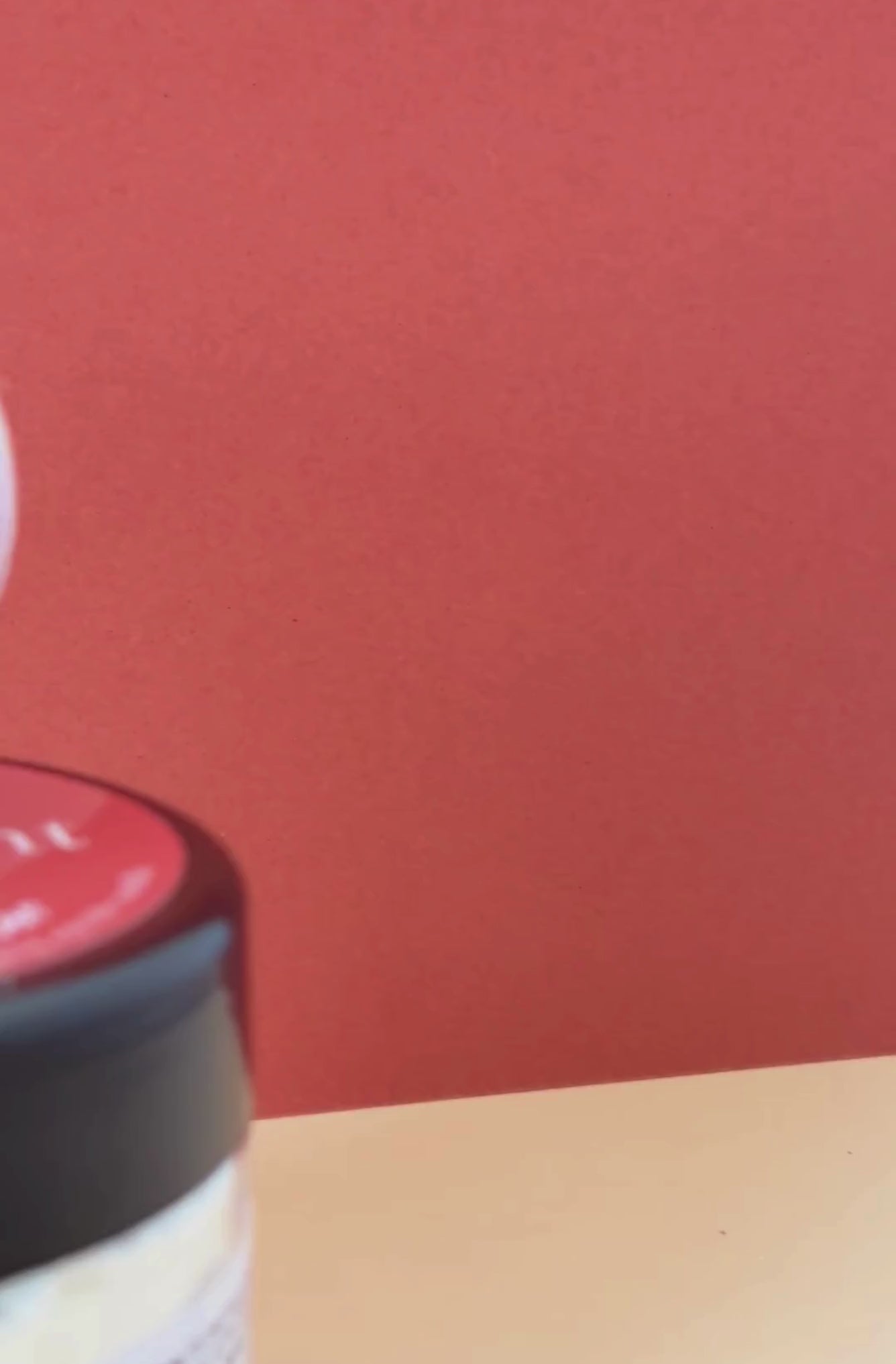 Video showcasing The Bright One whipped body butter 50ml jar with orange label and branding