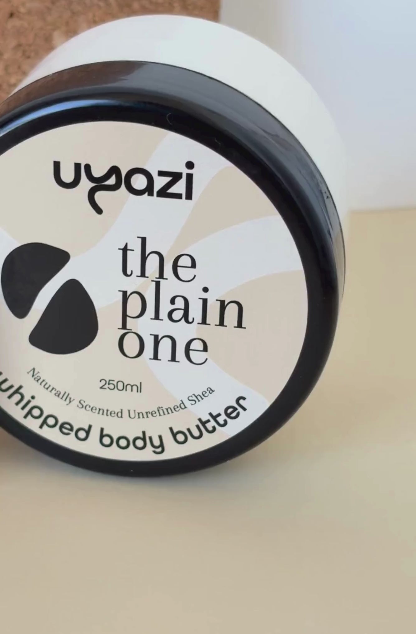 Video showcasing a 50ml and a 250ml jar of naturally scented whipped body butter