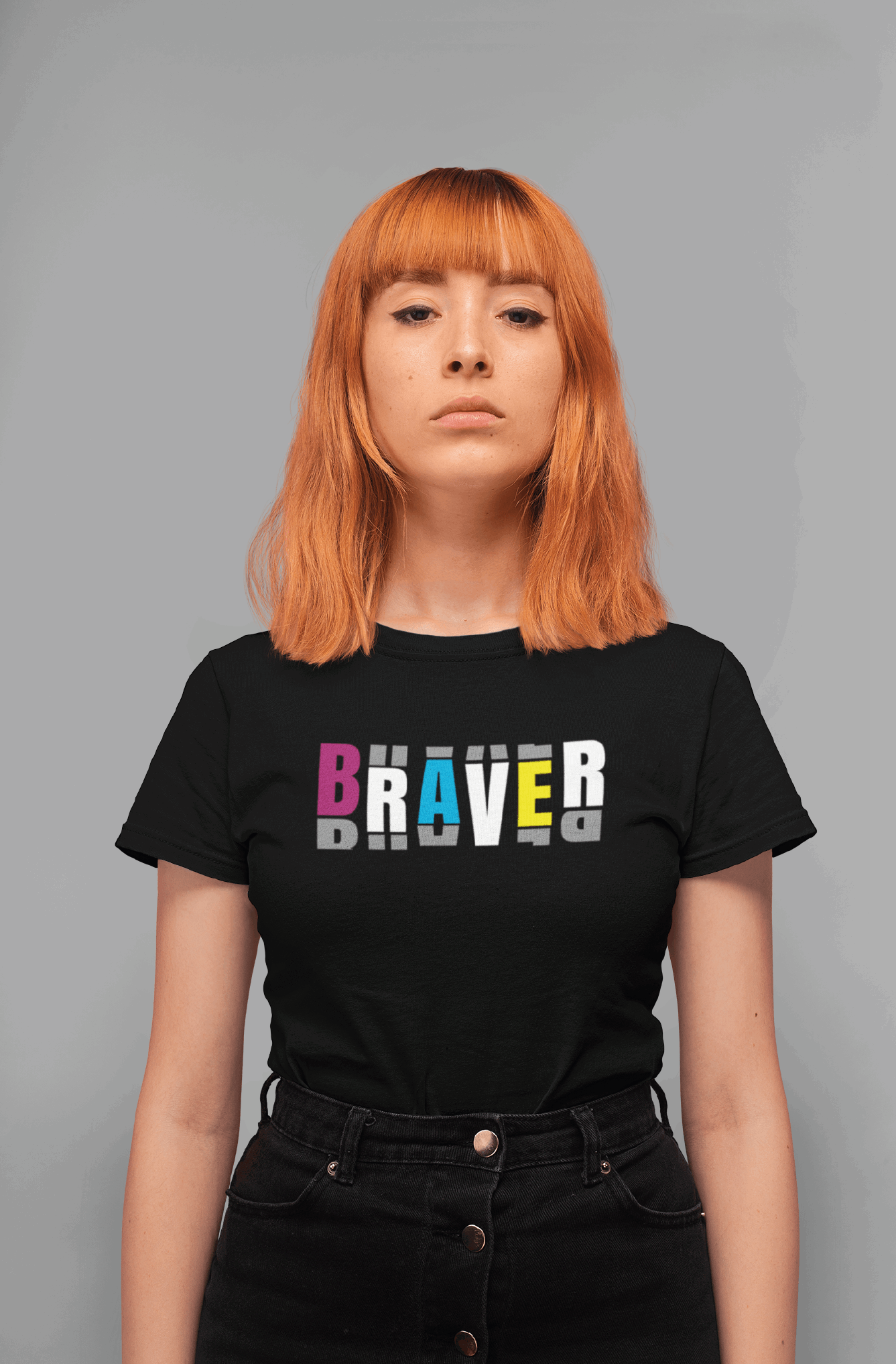 woman with red hair wearing black unisex tshirt with graphic text
